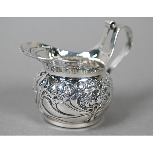 56 - A small Art Nouveau silver cream jug, James Dixon & Son, Sheffield 1901, three Victorian napkin ... 