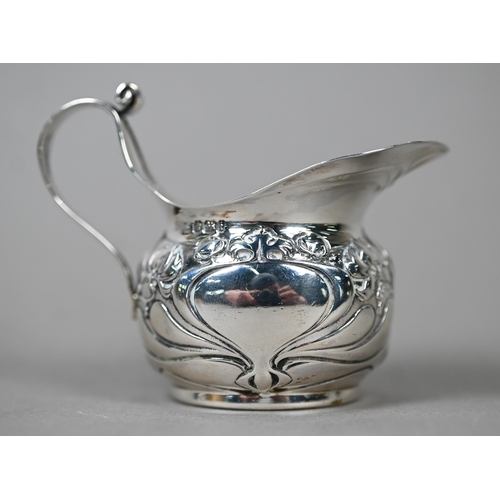 56 - A small Art Nouveau silver cream jug, James Dixon & Son, Sheffield 1901, three Victorian napkin ... 