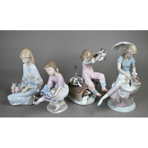 574 - Four boxed Lladro figures - 'Best Friend' 7620 and 'Pick of the Litter' 7621, to/w 'Picture Perfect'... 