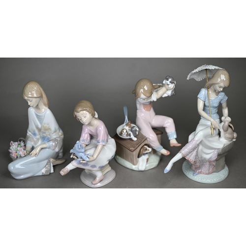 574 - Four boxed Lladro figures - 'Best Friend' 7620 and 'Pick of the Litter' 7621, to/w 'Picture Perfect'... 