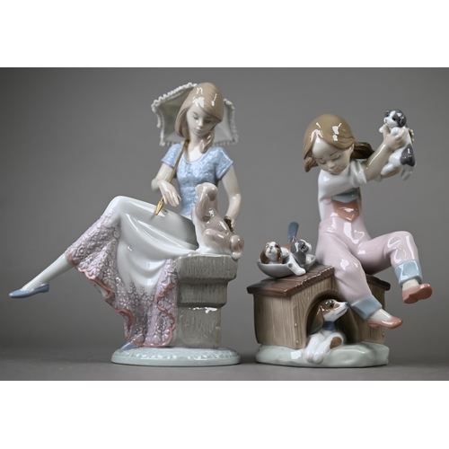 574 - Four boxed Lladro figures - 'Best Friend' 7620 and 'Pick of the Litter' 7621, to/w 'Picture Perfect'... 