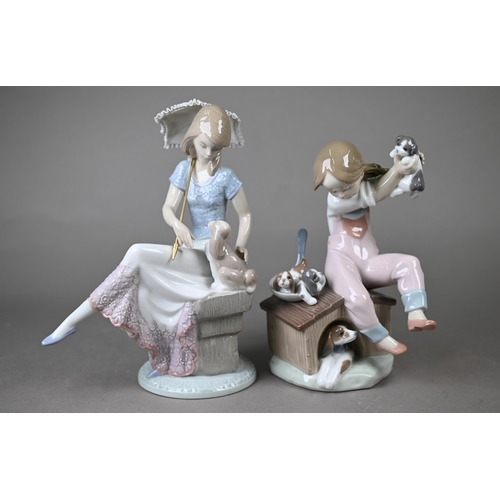 574 - Four boxed Lladro figures - 'Best Friend' 7620 and 'Pick of the Litter' 7621, to/w 'Picture Perfect'... 