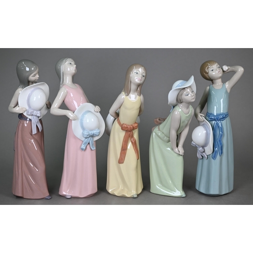 576 - Five unboxed Lladro figures of girls with hats, 13-15 cm, to/w a pair of Gres figures 'Tall' and 'Sh... 