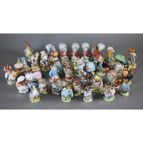 577 - A collection of thirty-four Beswick Beatrix Potter figures with brown back stamps - seven boxed (34)