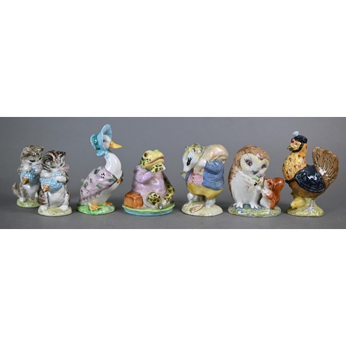 577 - A collection of thirty-four Beswick Beatrix Potter figures with brown back stamps - seven boxed (34)