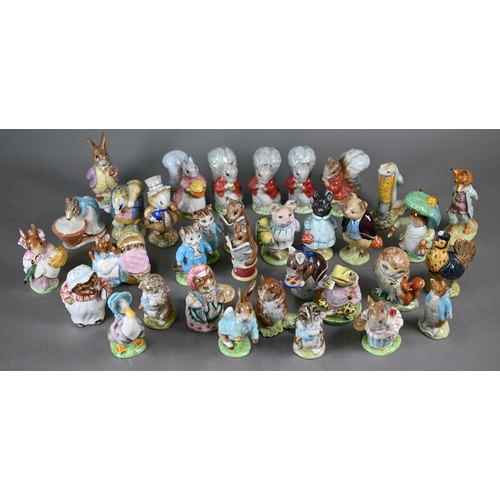 577 - A collection of thirty-four Beswick Beatrix Potter figures with brown back stamps - seven boxed (34)