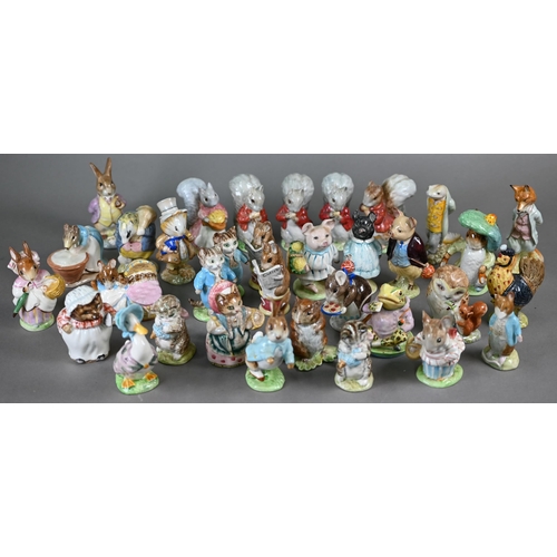 577 - A collection of thirty-four Beswick Beatrix Potter figures with brown back stamps - seven boxed (34)