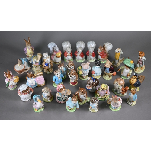 577 - A collection of thirty-four Beswick Beatrix Potter figures with brown back stamps - seven boxed (34)