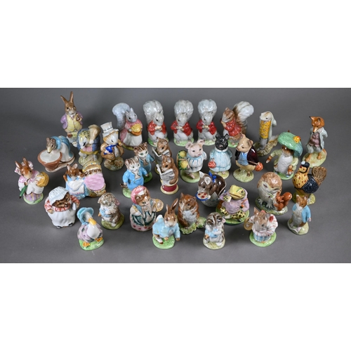 577 - A collection of thirty-four Beswick Beatrix Potter figures with brown back stamps - seven boxed (34)