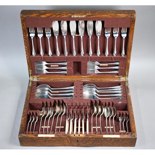 58 - An oak canteen fitted with a set of silver Hanoverian rat-tail flatware and cutlery, comprising six ... 