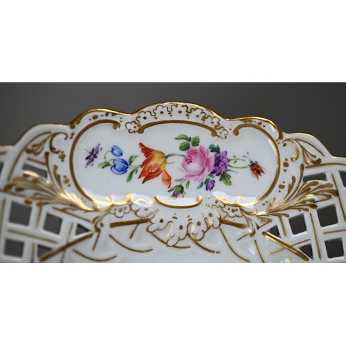 582 - Three Meissen cabinet plates, painted with floral sprays and insects within basket-weave pierced rim... 