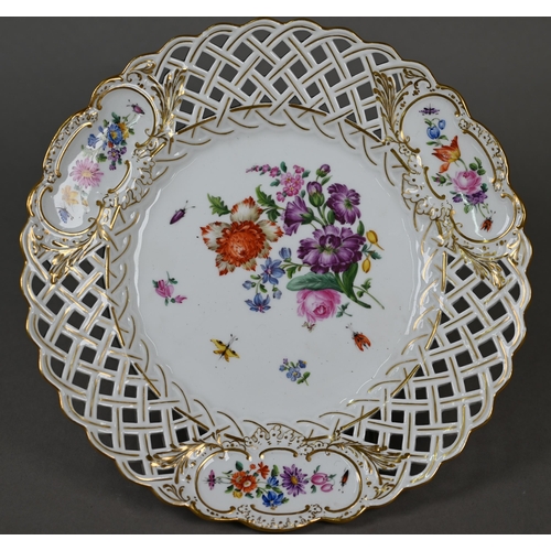 582 - Three Meissen cabinet plates, painted with floral sprays and insects within basket-weave pierced rim... 