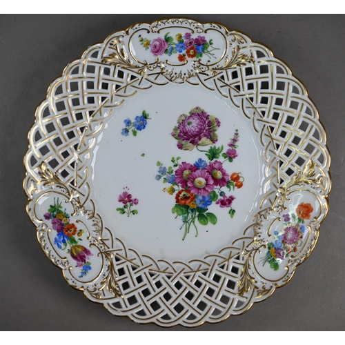 582 - Three Meissen cabinet plates, painted with floral sprays and insects within basket-weave pierced rim... 