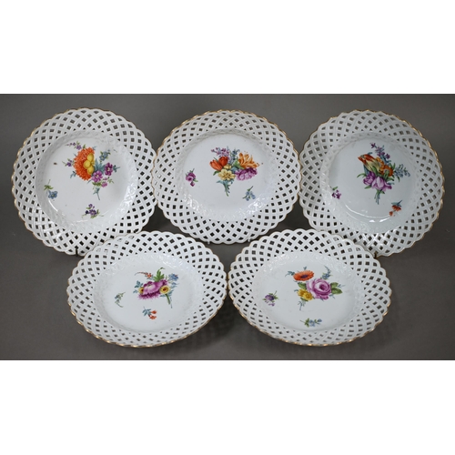 583 - Five Meissen cabinet plates, painted with floral sprays, within basket-weave lattice rims with gildi... 