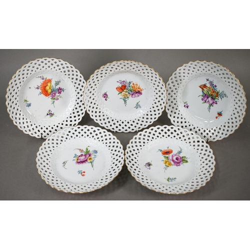 583 - Five Meissen cabinet plates, painted with floral sprays, within basket-weave lattice rims with gildi... 