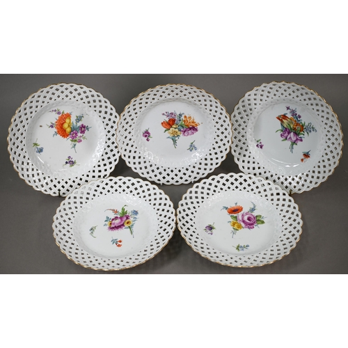 583 - Five Meissen cabinet plates, painted with floral sprays, within basket-weave lattice rims with gildi... 