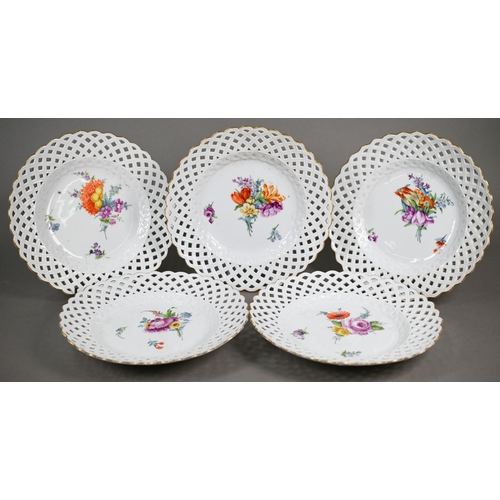 583 - Five Meissen cabinet plates, painted with floral sprays, within basket-weave lattice rims with gildi... 