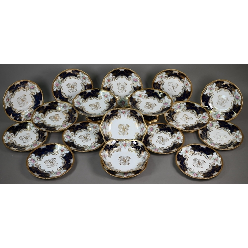 591 - A Limoges dessert service with HAC gilt monogram within border of painted and printed floral sprays ... 