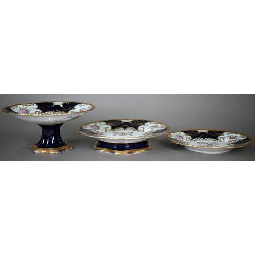 591 - A Limoges dessert service with HAC gilt monogram within border of painted and printed floral sprays ... 