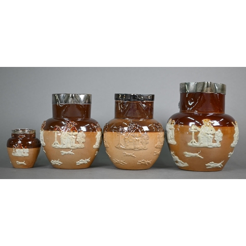 598 - Three Royal Doulton stoneware harvest jugs with silver rims, to/w a three-piece bachelor tea set and... 