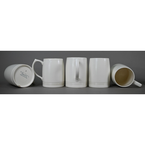 601 - Keith Murray for Wedgwood: a set of six cream glazed pint beer-mugs, 12 cm high, to/w a set of six c... 