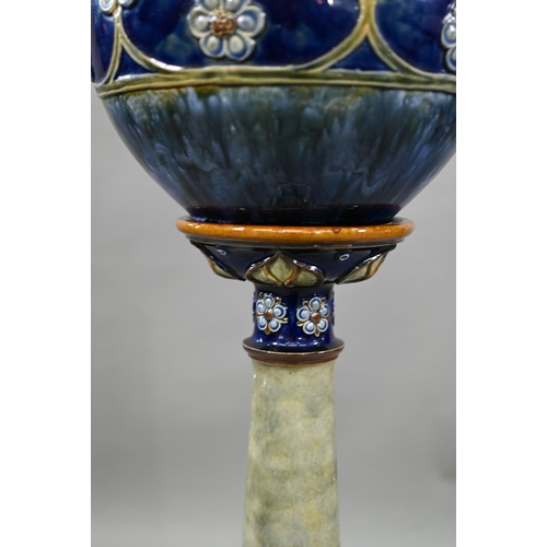 606 - An Edwardian Royal Doulton stoneware jardiniere on stand, impressed and painted with stylised floral... 