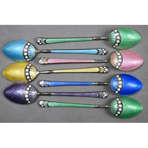 62 - A cased set of six silver gilt and enamel coffee spoons, Adie Bros Ltd, Birmingham 1960, to/w seven ... 