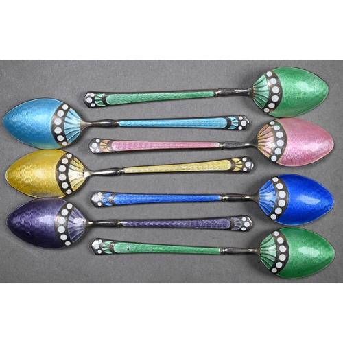 62 - A cased set of six silver gilt and enamel coffee spoons, Adie Bros Ltd, Birmingham 1960, to/w seven ... 