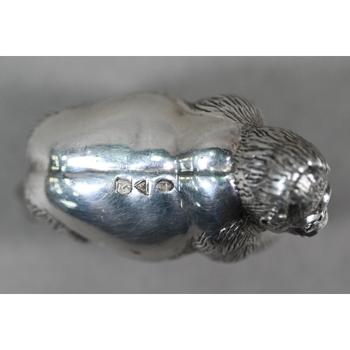 64 - Patrick Mavros (Zimbabwe): a heavy cast silver gorilla, date letter S, 10.6oz, 6cm high