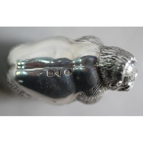 64 - Patrick Mavros (Zimbabwe): a heavy cast silver gorilla, date letter S, 10.6oz, 6cm high