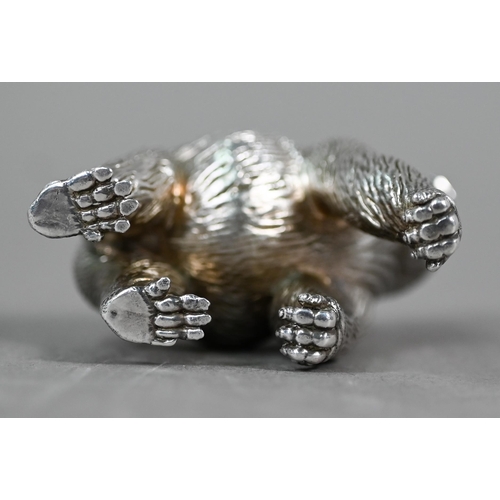 64 - Patrick Mavros (Zimbabwe): a heavy cast silver gorilla, date letter S, 10.6oz, 6cm high