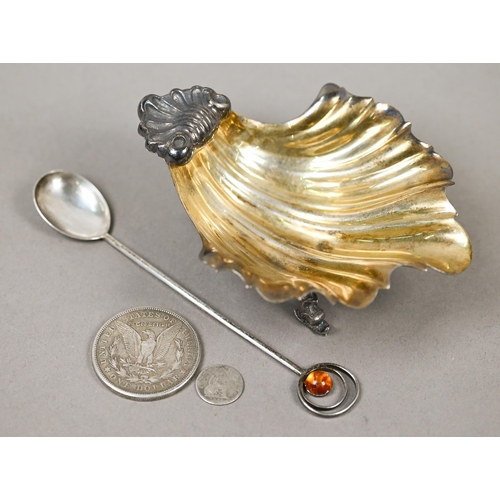 67 - A Miracoli (Milan) .800 grade and parcel-gilt shell dish on dolphin supports, 3.8oz, 13cm x 10cm, to... 