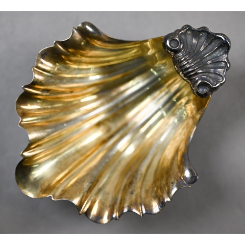 67 - A Miracoli (Milan) .800 grade and parcel-gilt shell dish on dolphin supports, 3.8oz, 13cm x 10cm, to... 