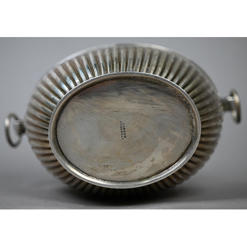 75 - A Victorian silver half-reeded sugar basin of elliptical form with ring handles, Frederick Brasted, ... 