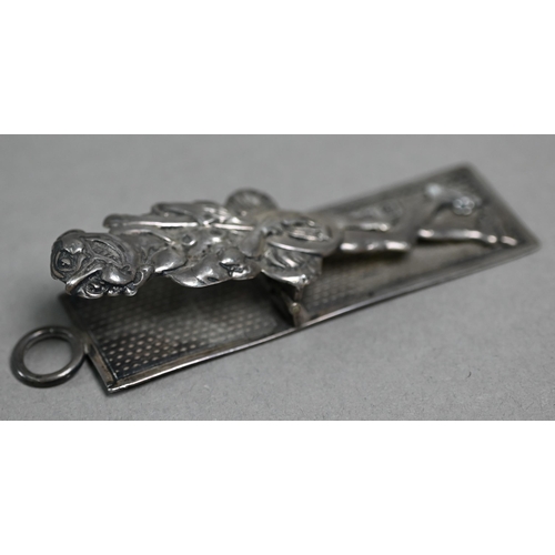 76 - A Victorian silver novelty spring-clip, featuring a humorous ecstatic troubadour, Rosenthal, Jacob &... 