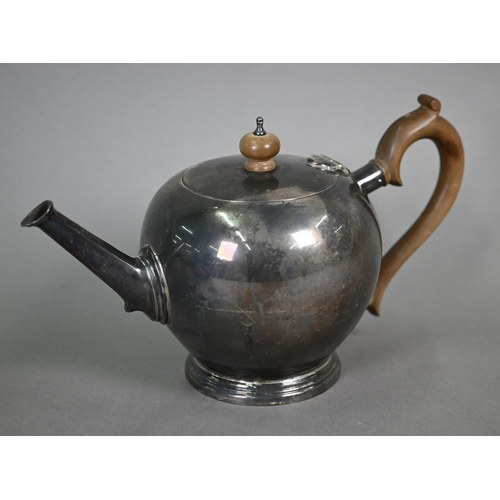 80 - A heavy quality silver bullet-shaped tea pot on the 18th Century manner, with wooden finial and scro... 