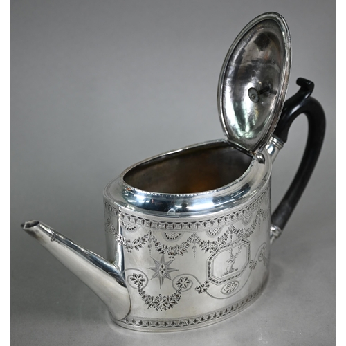 89 - A George III silver teapot of elliptical form with bright-cut and wrigglework engraving and stag's h... 