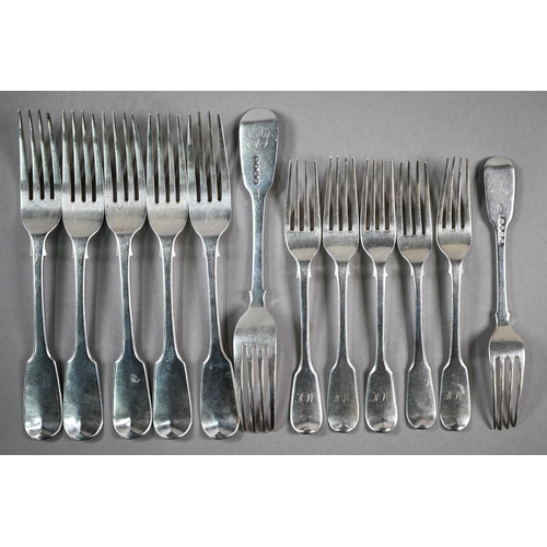 93 - A matched set of Georgian and Victorian silver fiddle pattern flatware, comprising six each tablespo... 