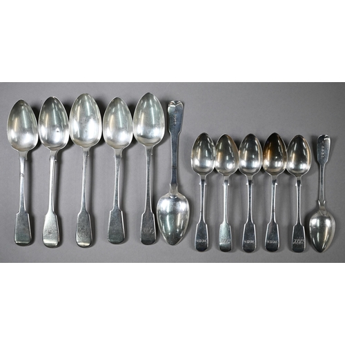 93 - A matched set of Georgian and Victorian silver fiddle pattern flatware, comprising six each tablespo... 