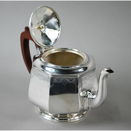 94 - A heavy quality Art Deco silver tea set of octagonal form, with engraved decoration and composite mo... 