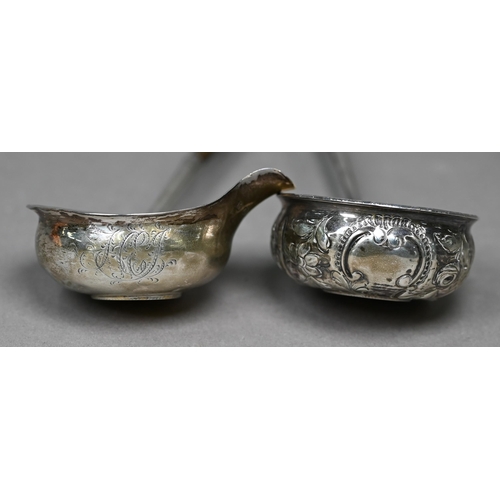 94A - A George III silver punch ladle, set with a gilt 1758 shilling, London 1788, on twisted whalebone st... 