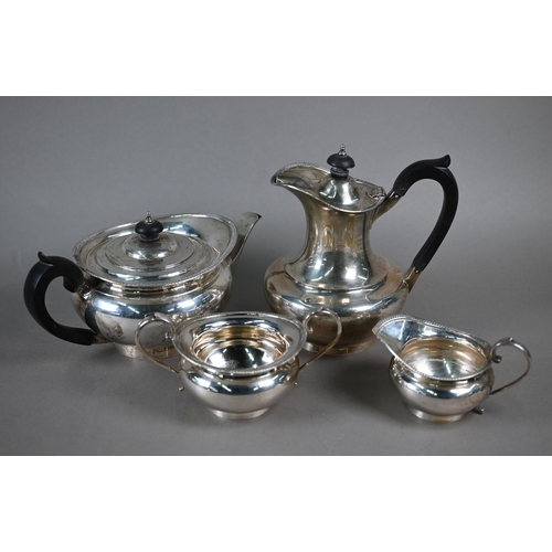 111 - A silver four-piece tea service in the Regency manner, with gadrooned Empire rim and composite mount... 