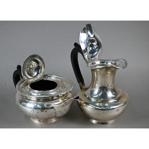 111 - A silver four-piece tea service in the Regency manner, with gadrooned Empire rim and composite mount... 