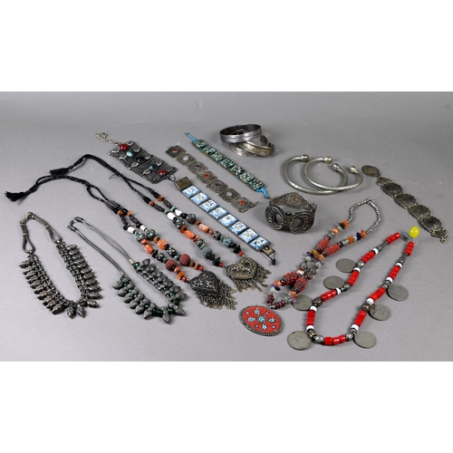 304 - A collection of white metal and other jewellery items including Maldivian coral and bead necklaces, ... 