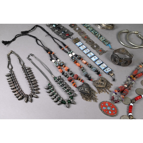 304 - A collection of white metal and other jewellery items including Maldivian coral and bead necklaces, ... 