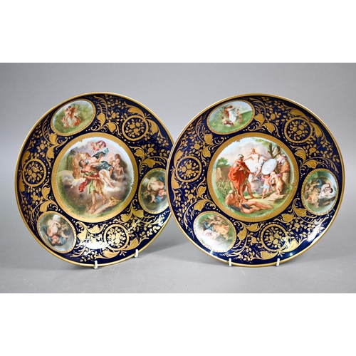 584 - A pair of Vienna cabinet dishes, the centres painted with mythological subjects, Athena giving Perse... 