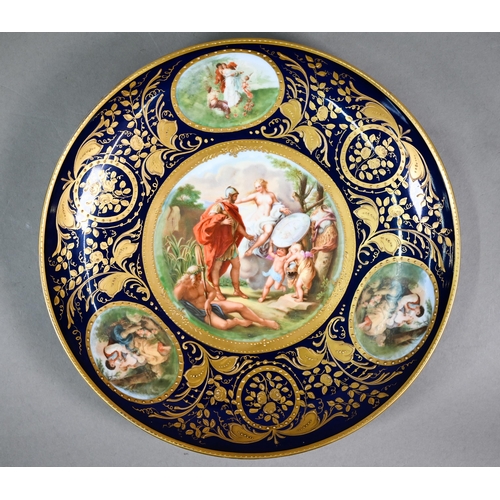 584 - A pair of Vienna cabinet dishes, the centres painted with mythological subjects, Athena giving Perse... 