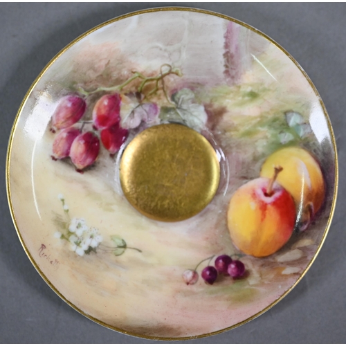 586 - A Royal Worcester miniature gilded cabinet cup and saucer painted with fruit, the 5.8 cm diameter cu... 