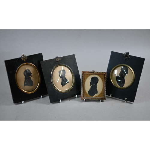 1025 - John Field (1771 - 1841): a pair of oval silhouette portraits of a lady, with lace cap and shawl, an... 