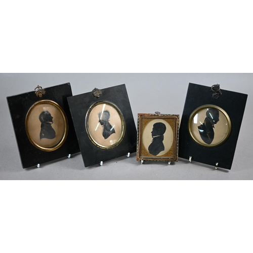 1025 - John Field (1771 - 1841): a pair of oval silhouette portraits of a lady, with lace cap and shawl, an... 